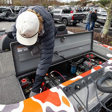Dylan Nutt installing Pro-Guide batteries in his boat